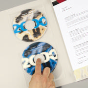 Self-adhesive CD/DVD Pocket, with Fingerhole, Permanent