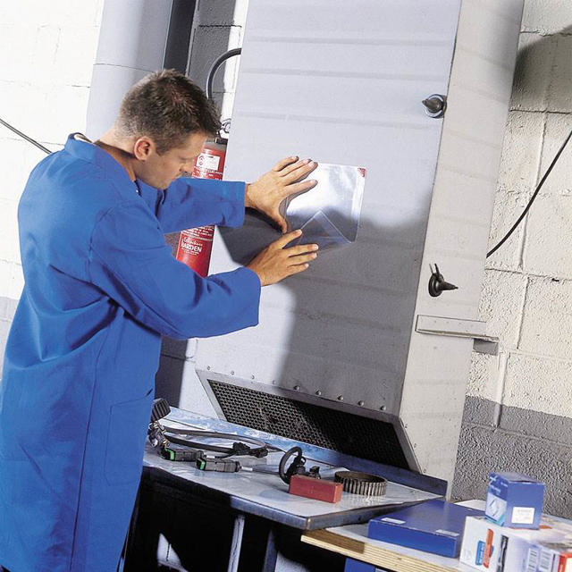 Easy Load Repositionable Pocket with Magnetic Corner Closure